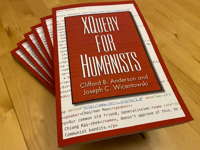 A stack of copies of XQuery for Humanists, hot off the press